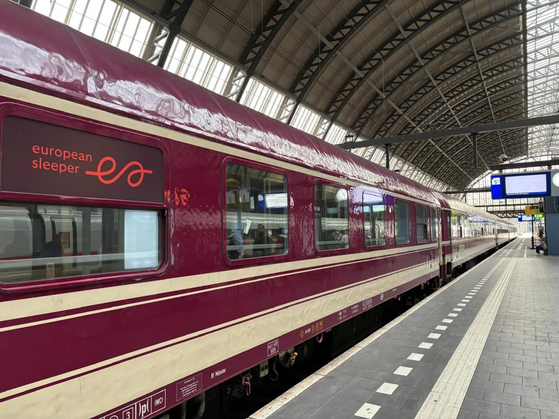 European Sleeper train at the platform in a train station.